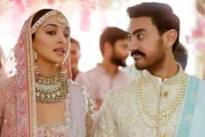 ކިއާރާ އާއި އެކުގައި އިޝްތިހާރެއް ކުޅުމުން އާމިރަށް މަލާމާތް ކުރަނީ