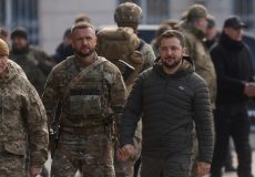 Ukraine’s President Zelenskiy arrives for a flag rising in central Kherson