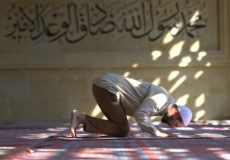 Muslim man praying in mosque, Turkey